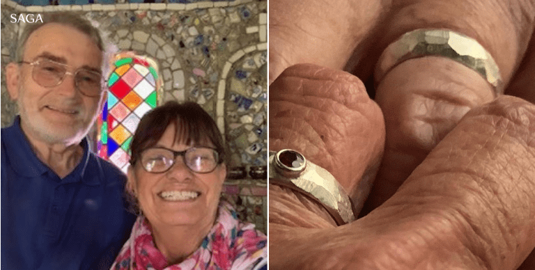 Two images side by side. One of the happy couple smiling into the camera as they take a selfie. A colourful stained glass window is behind them. The second image is a close up of their rings, made of hammered metak, one has a red stone.